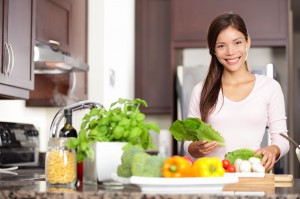 Woman cooking in new kitchen